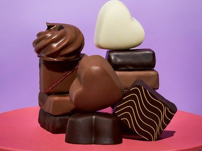 A group of pralines on a red base
