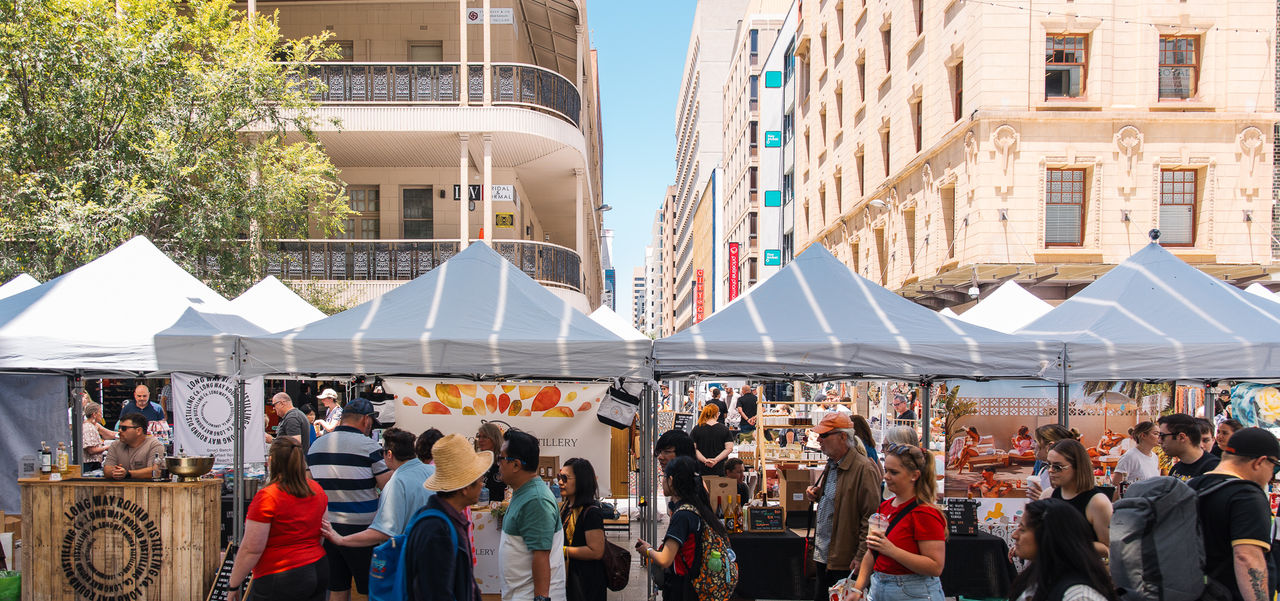Market in the Mall looking very busy with shoppers and stall