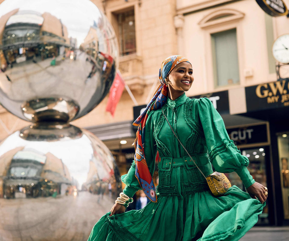 Girl spinning in dress at Malls Balls
