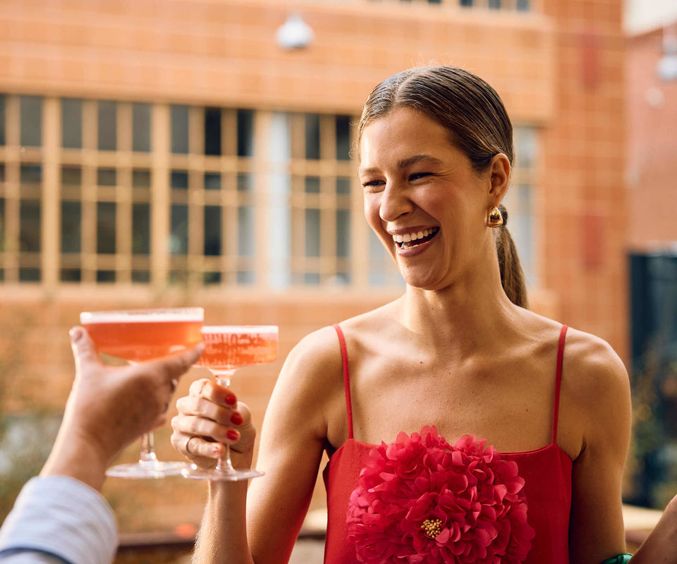 Celebrating on Two Bit Villains' balcony