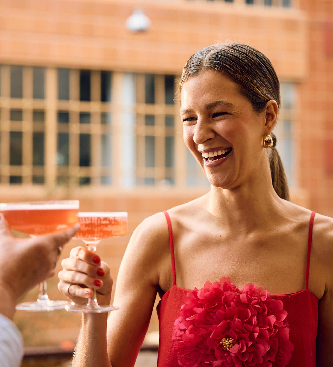 Celebrating on Two Bit Villains' balcony