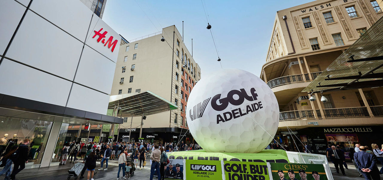LIV Golf giant 8m tall golf ball in Gawler Place intersection