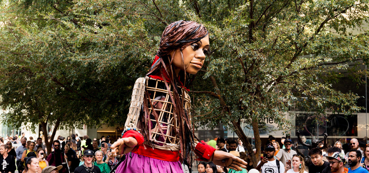 Little Amal giant puppet in Rundle Mall