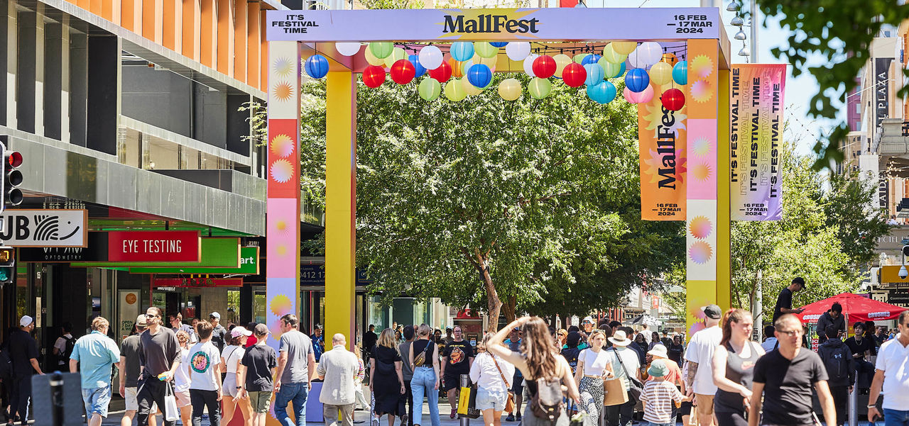 MallFest entry statement and busy crowd of shoppers