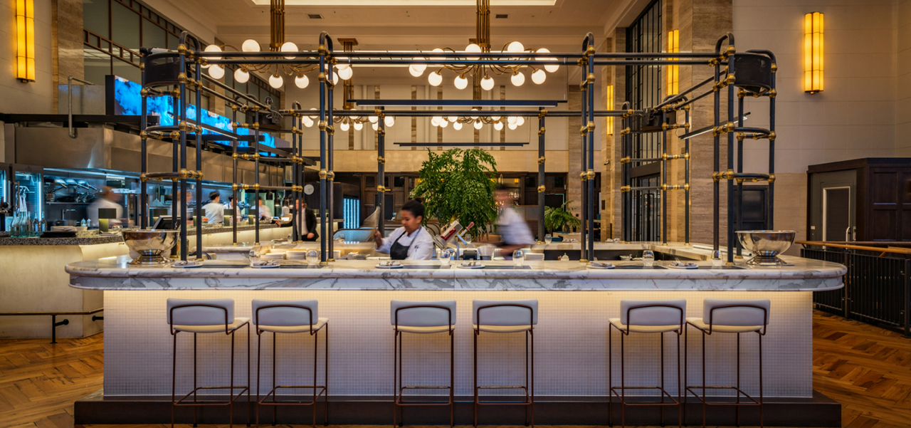 Fishbank restaurant, with their champagne bar and people preparing for dinner