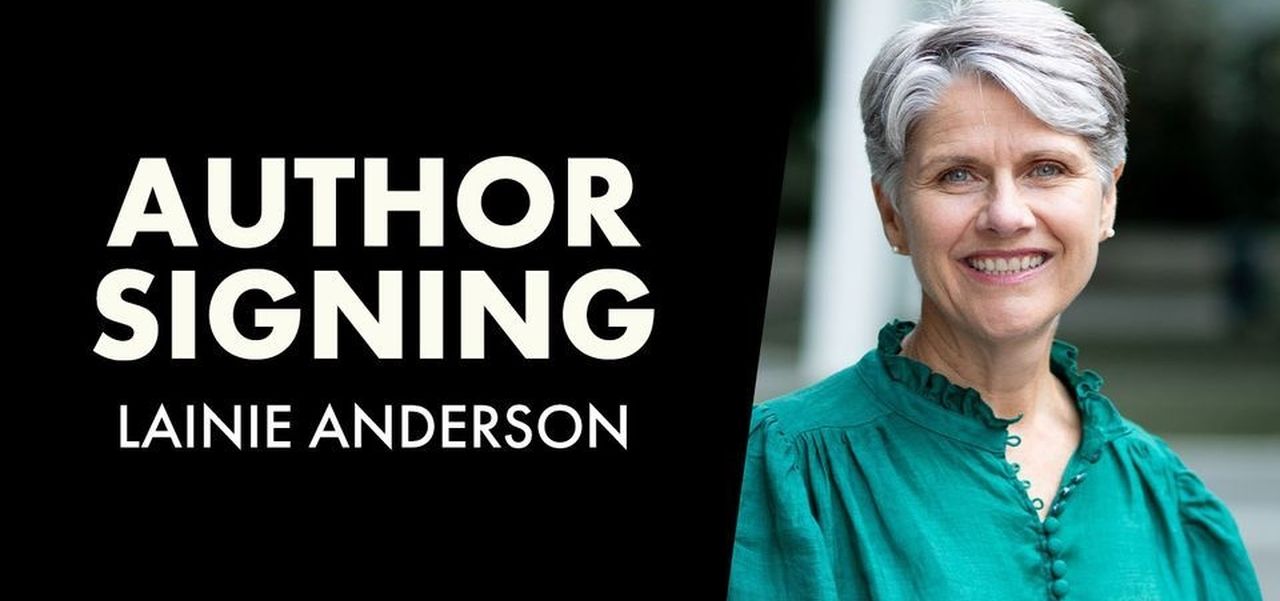 Author signing creative with a photo of Lainie Anderson smilng