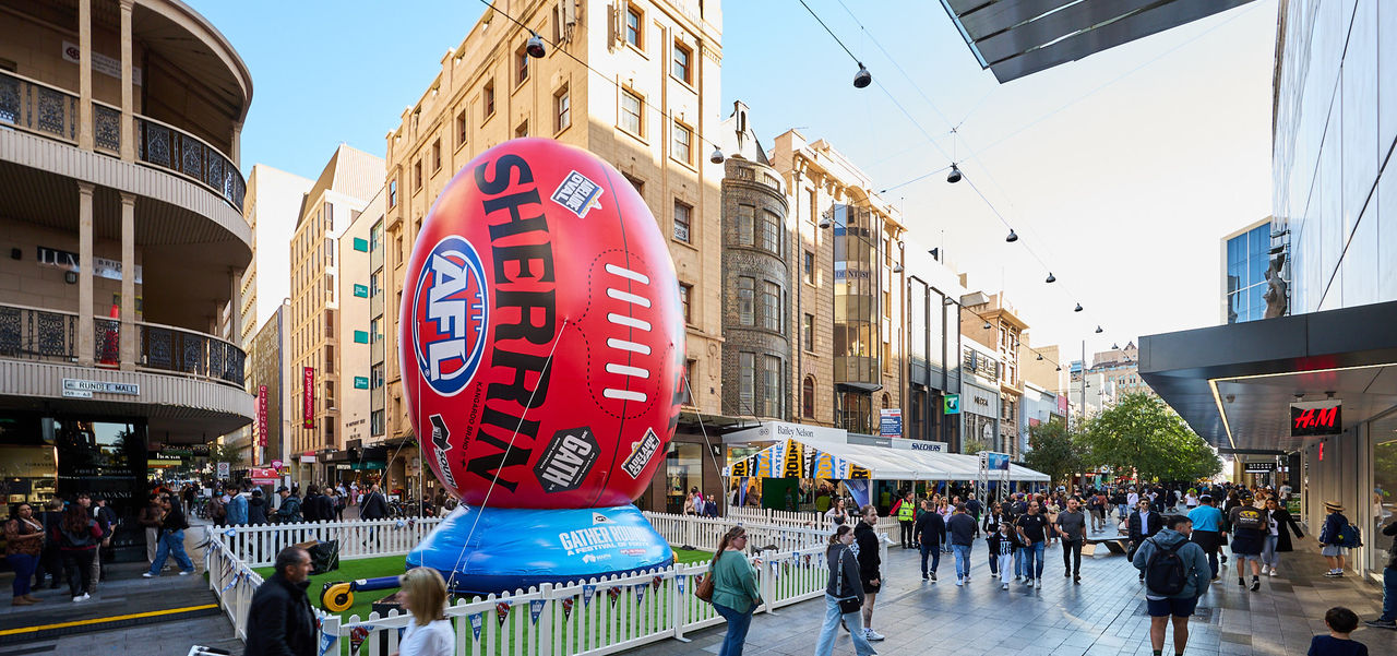 Giant inflatable AFL footy for Gather Round in the Mall