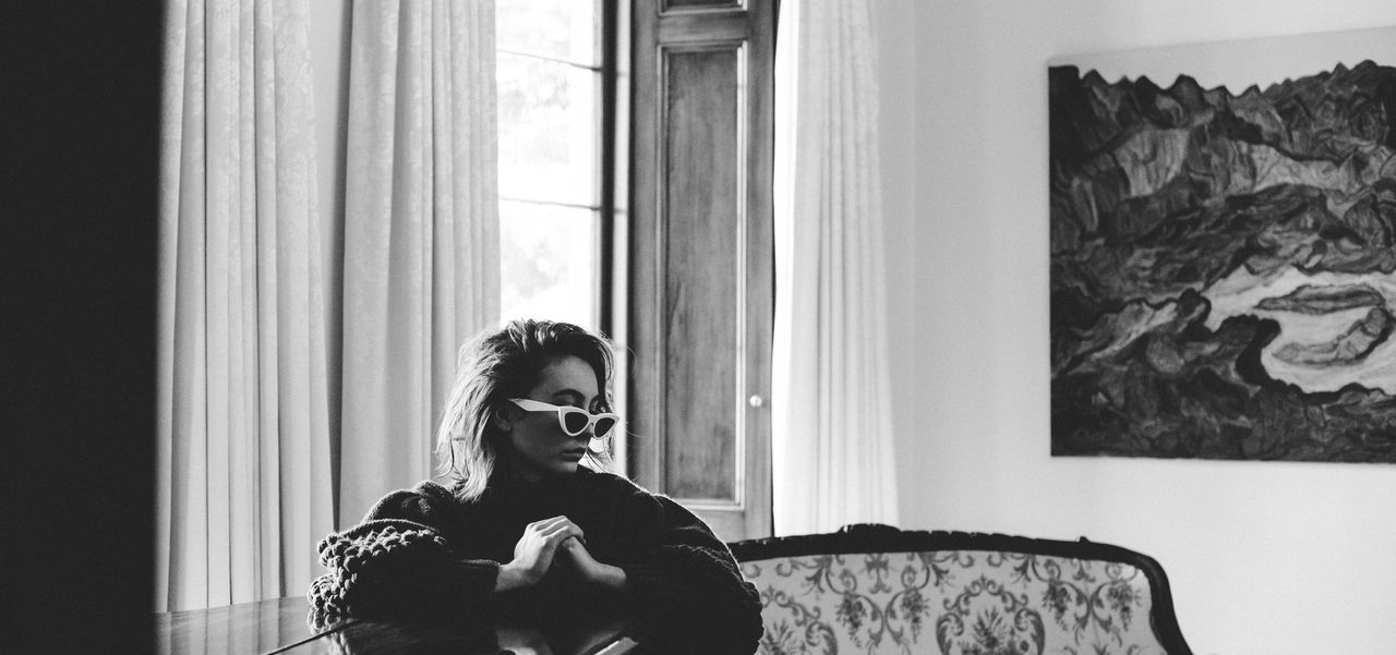 A woman sitting at a piano