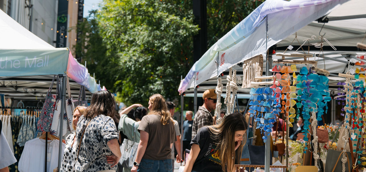 Busy shoppers at Gathered Market in the Mall