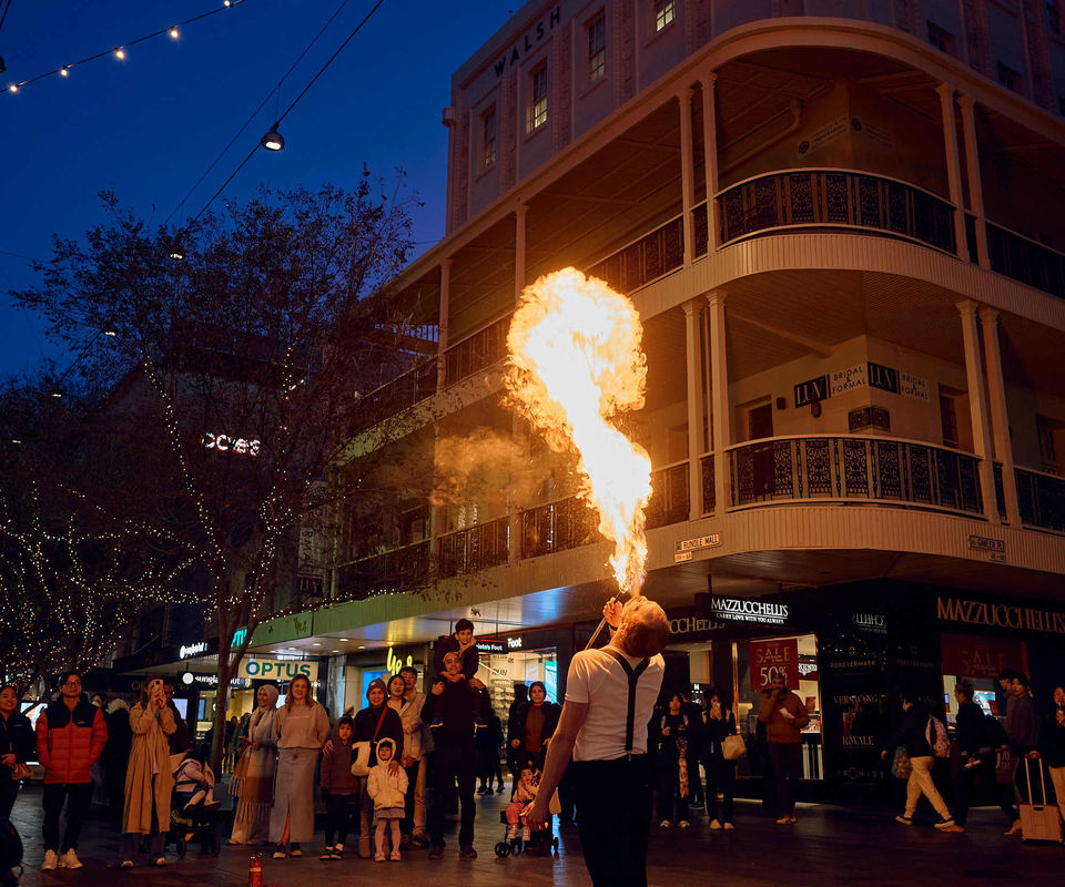 Fire breather performer in the Mall