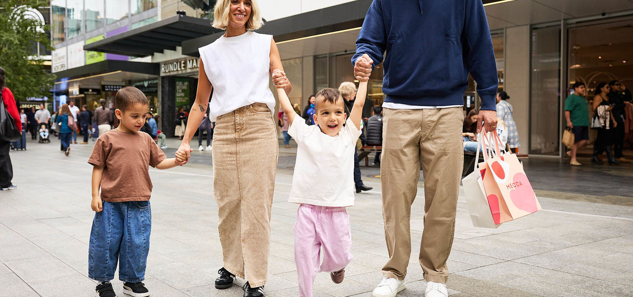 Kids and family walking through the Mall