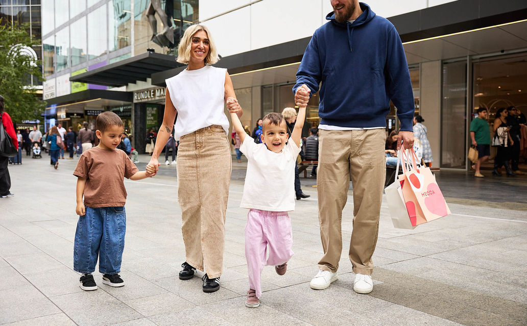 Kids and family walking through the Mall